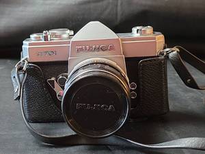 lot 229 image: Fujica ST701 35mm SLR Camera in Case (Classic Japanese-made SLR from the 1970s with silver and black finish)