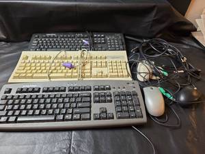 lot 254 image: eMachines and Neoware PS2 Keyboard Lot with Mouse and Cords