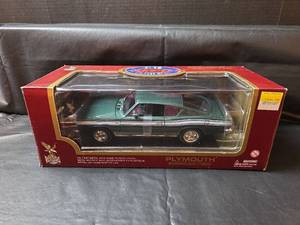 lot 274 image: NIB 1969 Plymouth Barracuda 118 Diecast Model Car