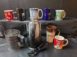 lot 282 image: Sunbeam Mixer with Assorted Coffee Mugs, and Sifter