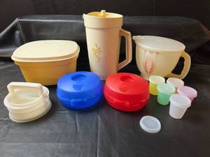 lot 315 image: Tupperware Bagel and Cream Cheese Holders, Microwave Steamer, Pitcher, and More