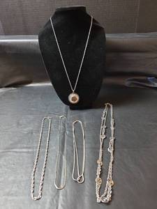 lot 430 image: Silver Toned Jewelry Collection with Medallion Necklace
