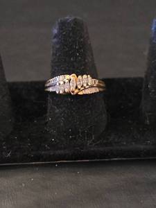 lot 431 image: 14K Gold Diamond Channel Set Ring wt. 4.39gm, Size 7.5