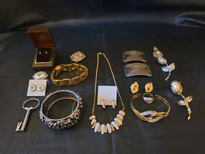 lot 451 image: Mixed Jewelry Collection with Gold and Silver Toned Pieces, includes Hand Ingraved Oriental Bracelet