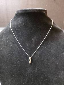 lot 478 image: Sterling Silver Infinity Twist Pendant Necklace wt. 2.51gm