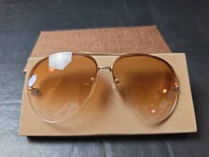 lot 566 image: Grasshopper Rimless Sunglasses