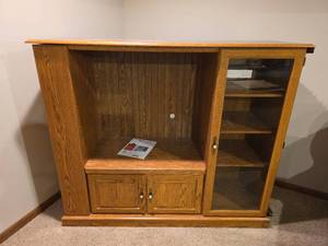 lot 605 image: Entertainment Center with Glass Door (Pool Que Rack on Side)