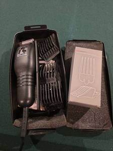 lot 628 image: Conair Hair Clipper Set with Prim Barber Guide Combs