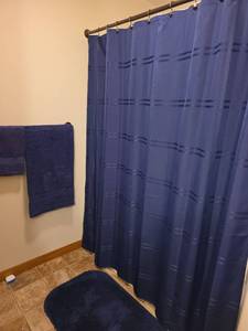 lot 631 image: Navy Blue Bathroom Set with Shower Curtain, Rug, and Towels