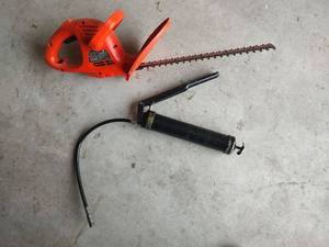 lot 5076 image: Black & Decker Electric Hedge Trimmer (Missing Cord) and Grease Gun