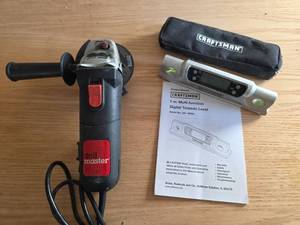 lot 6047 image: Craftsman Digital Level and Drill Master 4.5in. Angle Grinder