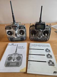 lot 6095 image: RC Transmitter Bundle - JR XP8103 and Spektrum DX7 with Manuals