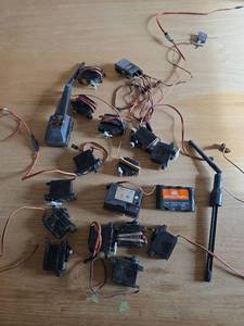 lot 6129 image: Spektrum RC Servo Collection with Battery Pack and other Supplies