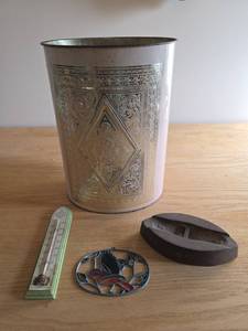 lot 6154 image: Metal Trash Can, Sad Iron, Thermometer, and Sun Catcher