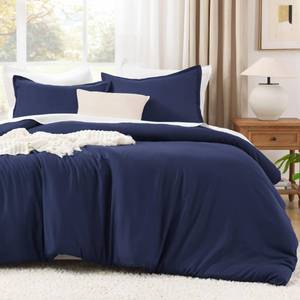 lot 5338 image: Litanika Navy Blue Comforter Set California King Size, 3 Pieces Cal King Lightweight Solid Bedding Comforter Set, All Season Fluffy Down Alternative Bed Set (104x96In Comforter and 2 Pillowcases) - Retail $64