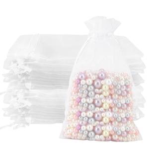 lot 2246 image: Organza Bags 4x6, 50Pcs Sheer Mesh Drawstring Gift Pouches for Wedding Favors, Candy, Party, Birthday, Festival, Soaps, Makeup, Wrapping Supplies - White - Retail $6