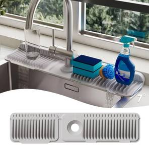 lot 2263 image: 24 Inch Silicone Faucet Mat for Kitchen Sink Splash Guard - 7° Slope Upgraded Water Draining Mat with Fasten Button for Bathroom Area (Gray, 24x5.5) - Retail $12