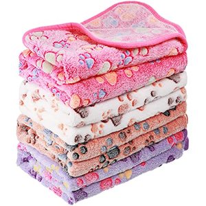 lot 4045 image: Tatuo 4 Pcs Dog Blanket for Pet Puppy Teething Toys Paw Print Fleece Blanket for Pet Cat Soft Warm Sleep Mat Guinea Pig Cage Mat(Medium(30 x 20.5 Inch),White, Coffee, Pink, Purple) - Retail $20