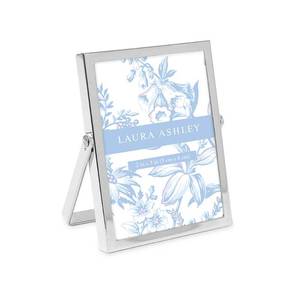 lot 20496 image: Laura Ashley 2x3 Silver Flat Metal Picture Frame (Vertical) with Pull-Out Easel Stand, Made for Tabletop, Counterspace, Shelf and Desk (2x3, Silver) - Retail $14