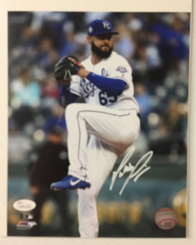 lot 1057 image: Signed Jakob Junis 8x10 Glossy Photograph Kansas City Royals Stud Pitcher in White Ink With James Spence Witnessed Authentication
