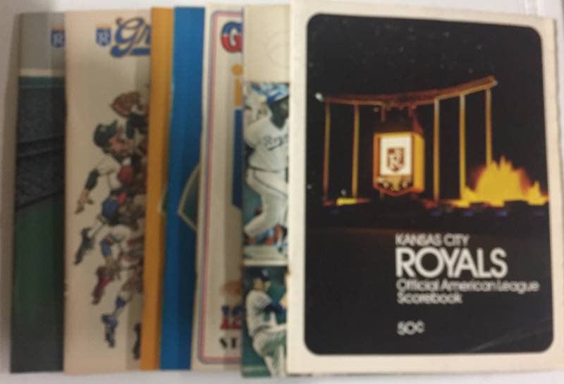 lot 1030 image: Complete Kansas City Royals Run of Game Day Scorebooks from 1973 to 1980 - Eight Total Scorebooks