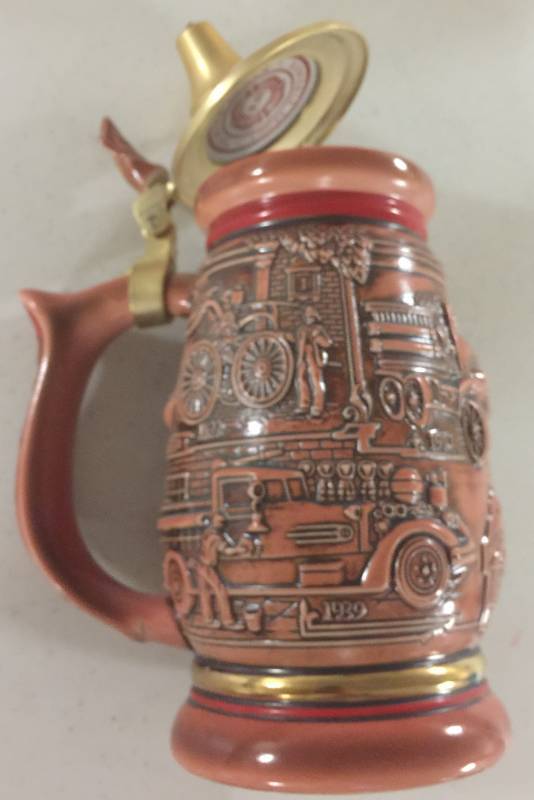 lot 1259 image: 1989 Avon Tribute To American Firefighters Collectors Stein
