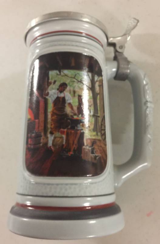 lot 1253 image: 1985 Avon Collectors Stein The Building Of America The Blacksmith
