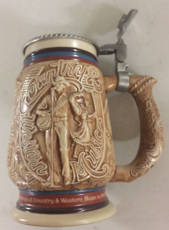 lot 1243 image: 1994 Avon Country & Western Music Collectors Stein