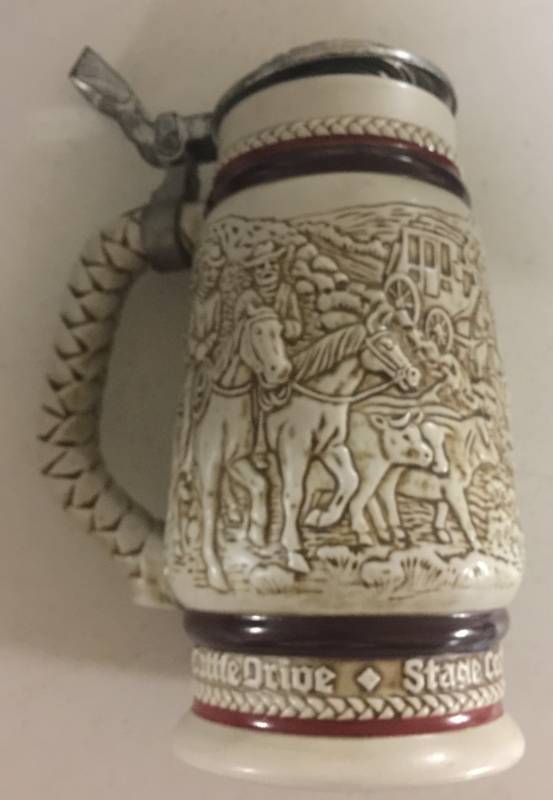 lot 1235 image: 1980 Avon Cowboys Cattle Drive Calm Roping Stage Coach Collectors Stein