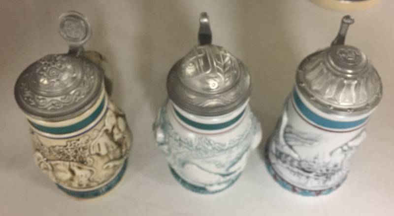 lot 1229 image: Three Mini Endangered Species Collectors Stein Sperm Whale, Bald Eagle, The Asian Elephant