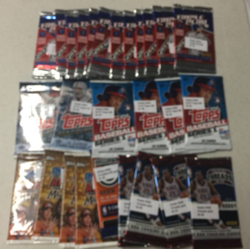 lot 1041 image: Lot of 27 Factory Sealed Trading Card Packs - Topps and Panini - Baseball, Basketball, Football, Wrestling