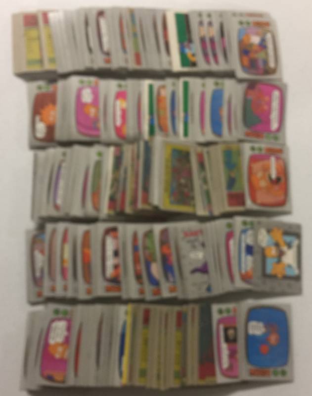 lot 1218 image: Huge Lot of Hundreds The Simpsons TV Show Trading Cards - Possible Sets- Lots of Duplicates