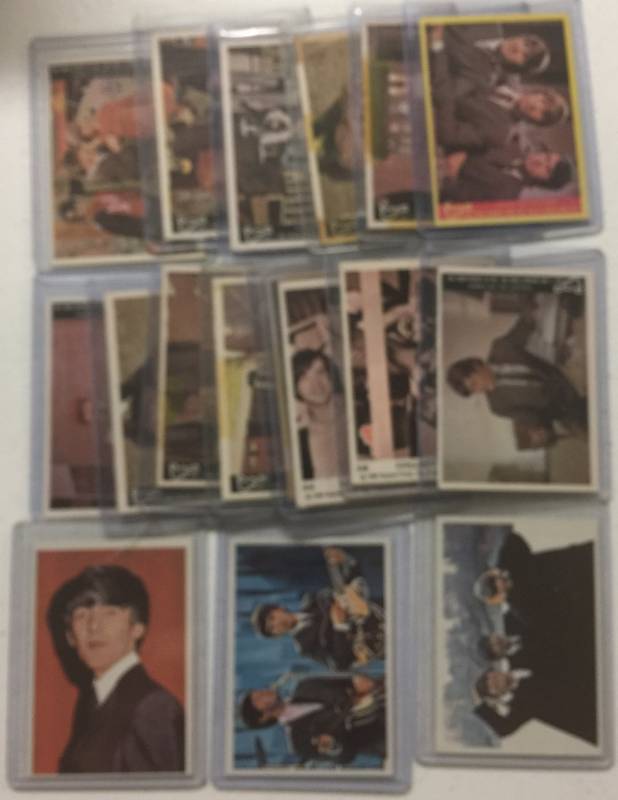 lot 1189 image: Huge Lot of 1964 Beatles & 1966 Monkees Trading Cards - Most have Tape Damage