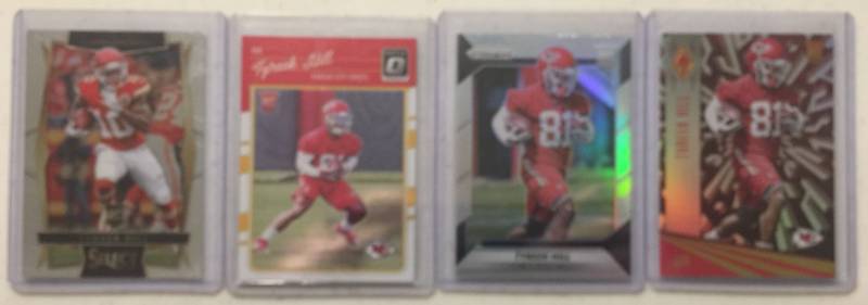 lot 1084 image: Four 2016 Panini Tyreek Hill Rookie Cards Kansas City Chiefs including Prizm (Silver Prizm), Phoenix, Optic, & Select - All Four One Money