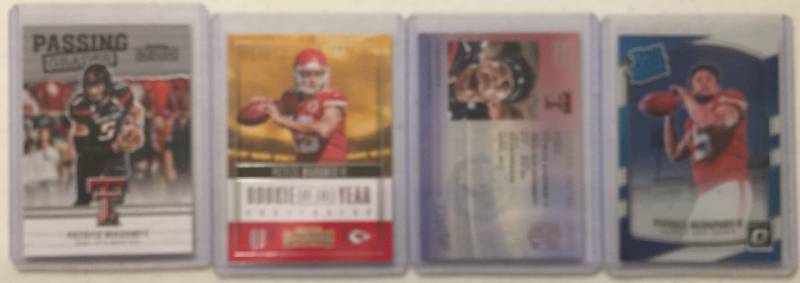 lot 1085 image: Four 2017 Panini Patrick Mahomes Rookie Cards Kansas City Chiefs - Donruss Optic, Contenders, Prestige, Contenders Draft Picks