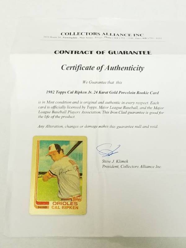 lot 1352 image: Cal Ripken Jr. 1982 Topps Gold Porcelain Rookie Card Limited Edition HOF w COA