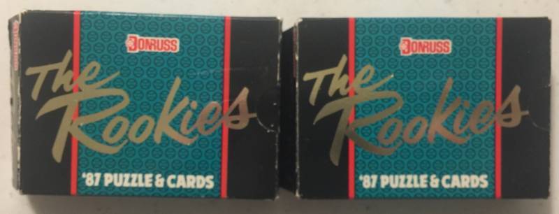 lot 1109 image: Two Complete Factory Sealed 1987 Donruss The Rookies Sets with Rookies of Bo Jackson, Mark McGwire, Greg Maddux with Roberto Clemente Puzzles