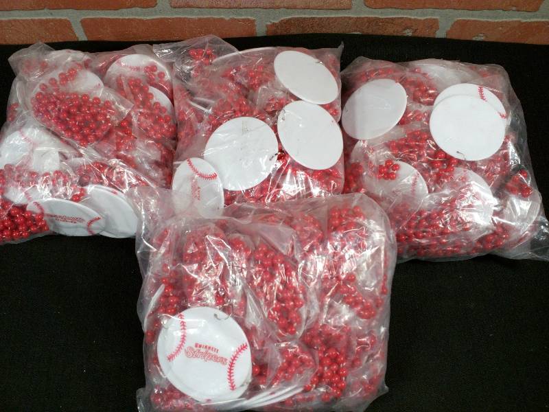 lot 102 image: Gwinnett Strippers Baseball Team Necklaces AAA