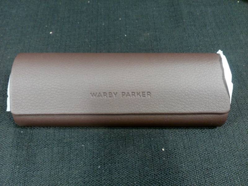 lot 110 image: Warby Parker Eye Glass Cases