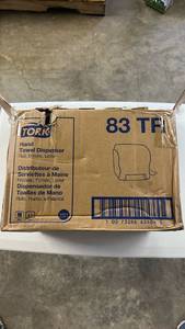 lot 17075 image: Tork 83TR Hand Towel Dispenser - Smoke Color - Retail $45