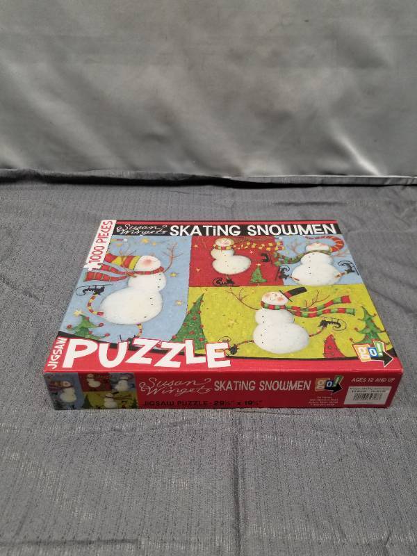 lot 12249 image: Susan Winget Skating Snowmen 1000 Piece Jigsaw Puzzle