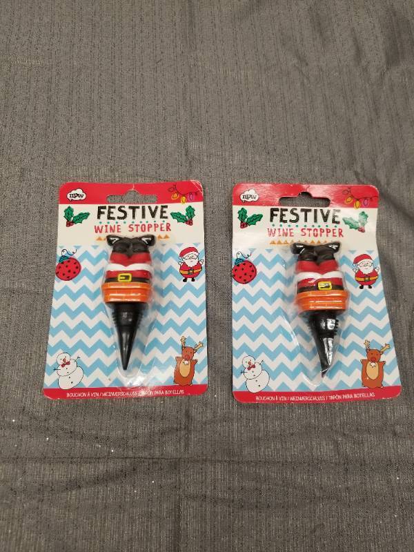 lot 12312 image: NPW Festive Santa Claus Wine Bottle Stoppers - Set of 2