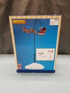 lot 3149 image: Lemax Santas Sleigh Animated Christmas Display Stand