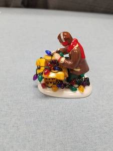lot 3159 image: Department 56 Christmas Light Untangler Figurine