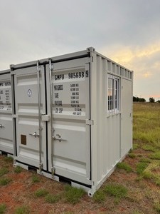 lot 1030N image: Unused 2025 11 Foot Long Shipping container with 2 end doors, side window, side entry door.  Weighs 1950 pounds.