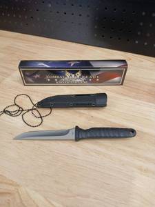 lot 42563 image: Combat Ready Tactical Neck Knife with Sheath - Retail $25