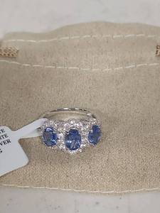 lot 3838 image: Sterling Silver Tanzanite and White Zircon Three-Stone Ring - Size 6