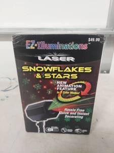 lot 3938 image: EZ-Illuminations Laser Snowflakes & Stars Light Projector