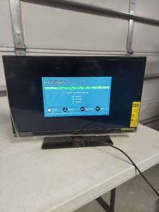 lot 4033 image: Insignia LCD TV with Built-in DVD Player 27in