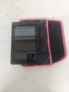 lot 1325 image: Amazon Kindle Fire with Pink Trim Case